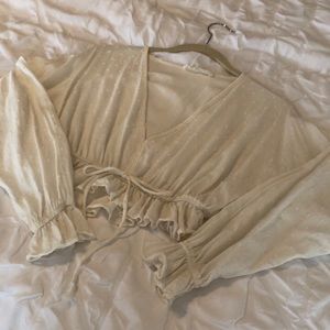 Cream top with textured dots